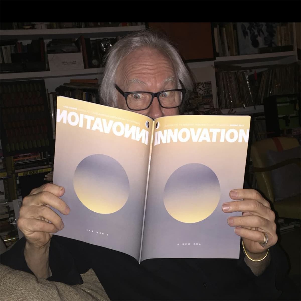 Tucker Viemeister reads a copy of INNOVATION magazine