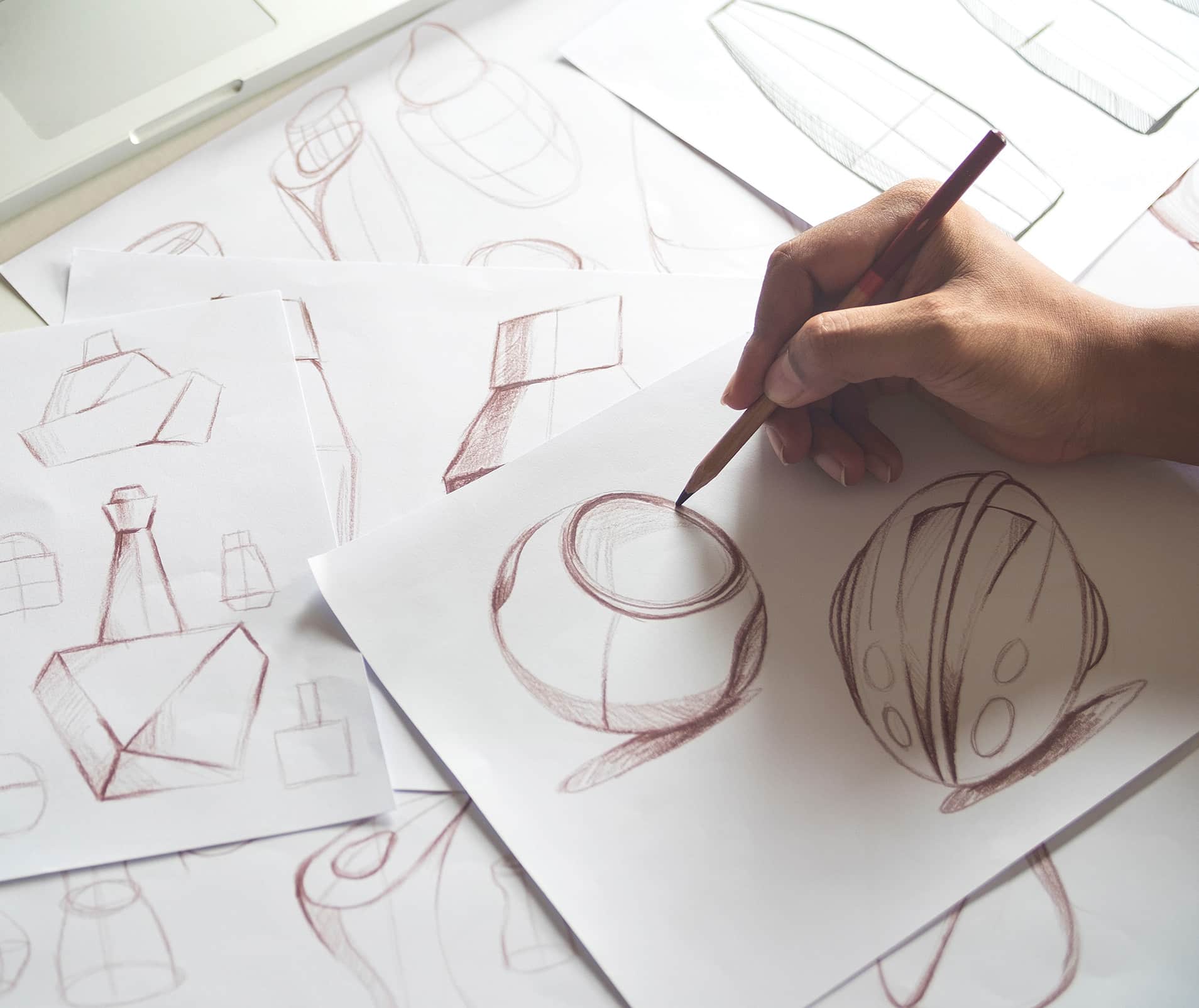 A designer sketches a new product